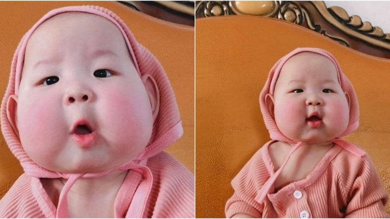 Charming Infant Captured Through Adorable Childhood Moments with Rosy Cheeks